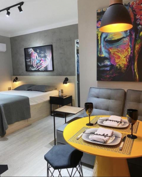 Studio moderno - Jardins: Cama Queen, Ar e Garagem